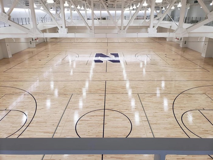 Northwestern Ryan Walter gym wood 2 - Perawatan Cepat Lantai Parket Basket Pasca Hujan